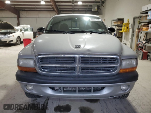 2004 Dodge Dakota Sport with VIN 1D7HG32N94S671966, listed as a Copart auction lot 88871585 with 223,091 mi miles and Salvage Title. Bid and sale history available at carsss.com. Image 5.