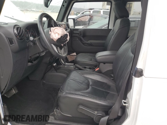 2015 Jeep Wrangler Altitude z VIN 1C4GJWBG8FL730965, wystawiony jako Copart lot #86276064 z przebiegiem 43 541 mil mil oraz Szkoda całkowita • Salvage title. Historia ofert i sprzedaży dostępna na DreamBid. Obrazek 7.