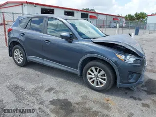 2013 Mazda CX-5 Touring with VIN JM3KE2CE8D0123488, listed as a IAAI auction lot 41952747 with 201,426 mi miles. Bid and sale history available at carsss.com. Image 1.