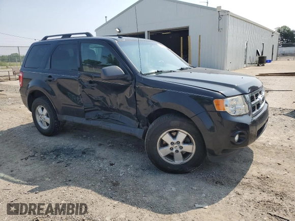 2011 Ford Escape XLT with VIN 1FMCU9DG6BKB03780, listed as a Copart auction lot 60322715 with 97,581 mi miles and Salvage title. Bid and sale history available at DreamBid. Image 4.