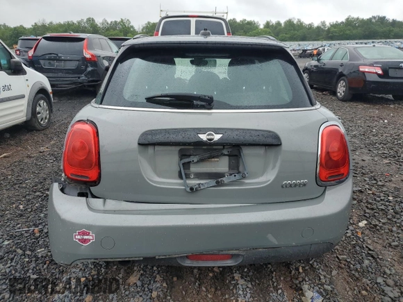 2016 MINI Hardtop 4 Door with VIN WMWXU1C53G2D08231, listed as a Copart auction lot 61050035 with 128,267 mi miles and Salvage title. Bid and sale history available at DreamBid. Image 6.