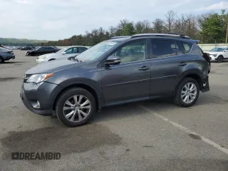 2015 Toyota RAV4 Limited with VIN JTMDFREV3FJ026913, listed as a Copart auction lot 65201135 with 74,354 mi miles and Salvage title. Bid and sale history available at DreamBid. Image 1.