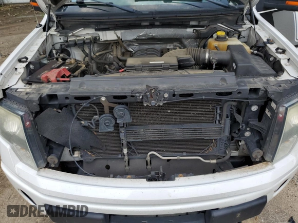 2014 Ford F-150 XL with VIN 1FTFW1EF4EFB77909, listed as a Copart auction lot 60409575 with 201,434 mi miles and Salvage title. Bid and sale history available at DreamBid. Image 11.