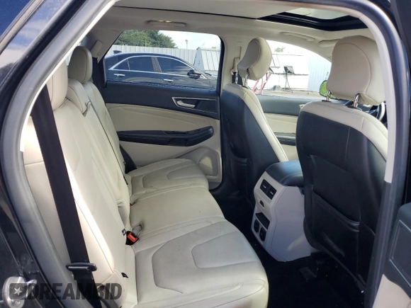 2015 Ford Edge Titanium z VIN 2FMTK4K86FBB88124, wystawiony jako Copart lot #57392305 z przebiegiem 95 698 mil mil oraz Szkoda całkowita • Salvage title. Historia ofert i sprzedaży dostępna na DreamBid. Obrazek 10.