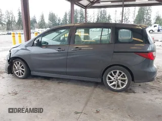 2014 Mazda 5 Touring with VIN JM1CW2CL7E0167945, listed as a IAAI auction lot 41624435 with 167,736 mi miles. Bid and sale history available at carsss.com. Image 14.