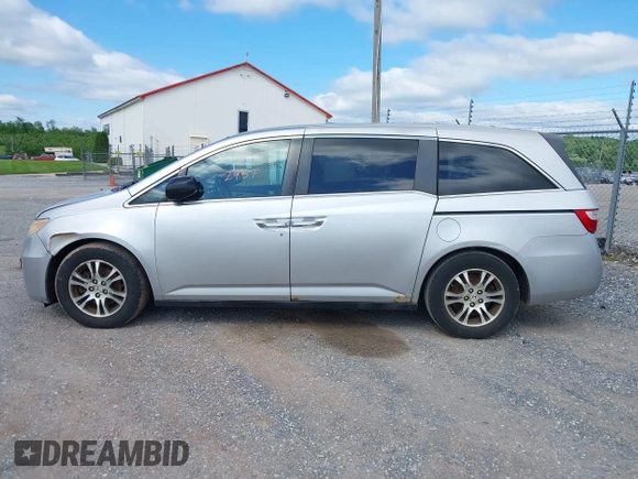 2012 Honda Odyssey EX-L with VIN 5FNRL5H63CB063815, listed as a IAAI auction lot 42302937 with 377,768 mi miles and . Bid and sale history available at DreamBid. Image 14.