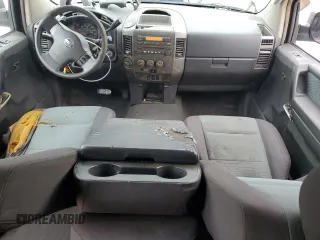 2006 Nissan Titan LE z VIN 1N6BA07B16N557411, wystawiony jako Copart lot #86058634 z przebiegiem 263 198 mil mil oraz Szkody całkowita. Historia ofert i sprzedaży dostępna na DreamBid. Obrazek 8.