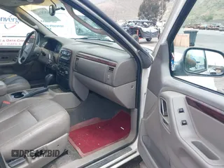 2002 Jeep Grand Cherokee Limited with VIN 1J4GX58S52C305020, listed as a IAAI auction lot 42025324 with 214,214 mi miles and . Bid and sale history available at DreamBid. Image 5.