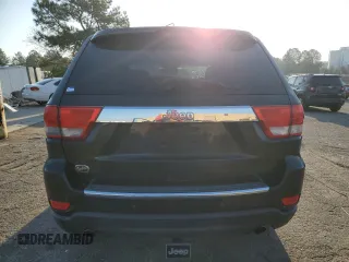 2011 Jeep Grand Cherokee Overland with VIN 1J4RS6GT5BC648076, listed as a Copart auction lot 48878135 with 223,263 mi miles and Salvage Title. Bid and sale history available at DreamBid. Image 6.