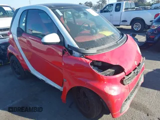 2014 Smart fortwo Pure with VIN WMEEJ3BA0EK757200, listed as a IAAI auction lot 41681977 with 99,245 mi miles and . Bid and sale history available at DreamBid. Image 1.