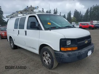 2013 Chevrolet Express Cargo Van with VIN 1GCSGAFX0D1111985, listed as a IAAI auction lot 42065556 with 243,671 mi miles. Bid and sale history available at carsss.com. Image 1.