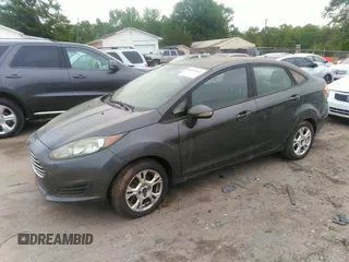 2015 Ford Fiesta SE with VIN 3FADP4BJ8FM178485, listed as a IAAI auction lot 42095511 with 151,064 mi miles. Bid and sale history available at carsss.com. Image 2.