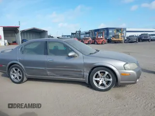 2003 Nissan Maxima GLE z VIN JN1DA31A83T411224, wystawiony jako IAAI lot #41905714 z przebiegiem Nie podano mil oraz . Historia ofert i sprzedaży dostępna na DreamBid. Obrazek 13.