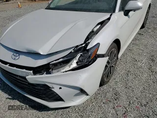 2025 Toyota Camry LE z VIN 4T1DAACK9SU054048, wystawiony jako Copart lot #53659075 z przebiegiem 3 568 mil mil oraz Szkoda całkowita • Salvage title. Historia ofert i sprzedaży dostępna na DreamBid. Obrazek 13.
