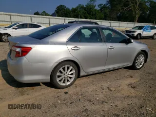 2012 Toyota Camry XLE z VIN 4T1BD1FKXCU007915, wystawiony jako Copart lot #60313605 z przebiegiem 186 574 mil mil oraz Szkoda całkowita • Salvage title. Historia ofert i sprzedaży dostępna na DreamBid. Obrazek 3.