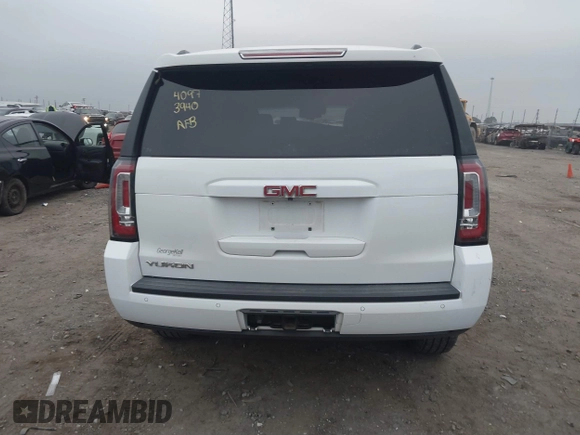 2018 GMC Yukon SLT with VIN 1GKS1BKC3JR279163, listed as a IAAI auction lot 40973940 with 122,445 mi miles. Bid and sale history available at carsss.com. Image 16.