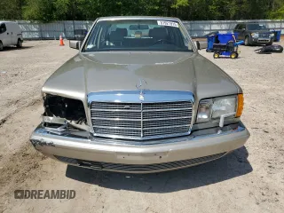 1991 Mercedes-Benz 560 with VIN WDBCA39E9MA599487, listed as a Copart auction lot 51921915 with 59,132 mi miles and Salvage Title. Bid and sale history available at DreamBid. Image 5.