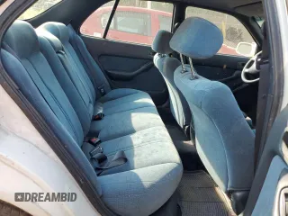 1992 Toyota Camry z VIN 4T1VK12E0NU015172, wystawiony jako Copart lot #58974095 z przebiegiem 210 163 mil mil oraz Szkoda całkowita • Salvage title. Historia ofert i sprzedaży dostępna na DreamBid. Obrazek 10.