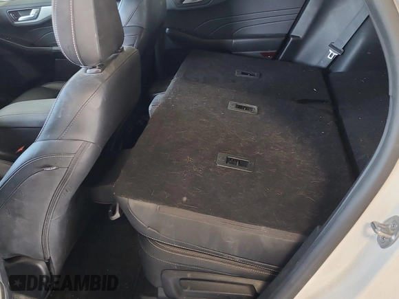 2021 Ford Escape SEL Hybrid with VIN 1FMCU9CZ1MUB25597, listed as a IAAI auction lot 42663573 with 79,061 mi miles and . Bid and sale history available at DreamBid. Image 21.