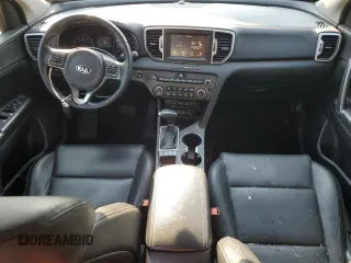 2017 Kia Sportage EX with VIN KNDPNCAC9H7054281, listed as a Copart auction lot 60571945 with 106,516 mi miles and Salvage title. Bid and sale history available at DreamBid. Image 8.