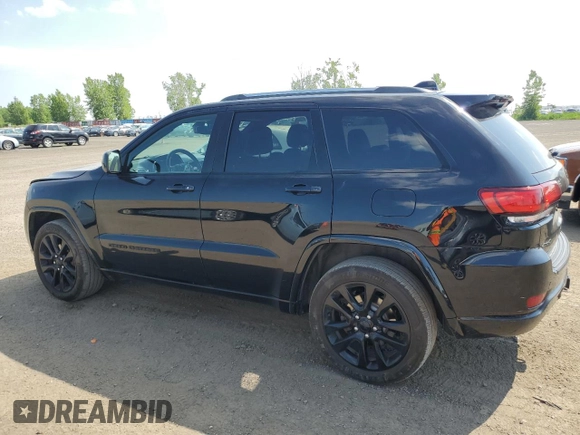 2019 Jeep Grand Cherokee Altitude with VIN 1C4RJFAG5KC813144, listed as a Copart auction lot 62295595 with 140,986 mi miles and Salvage title. Bid and sale history available at DreamBid. Image 2.