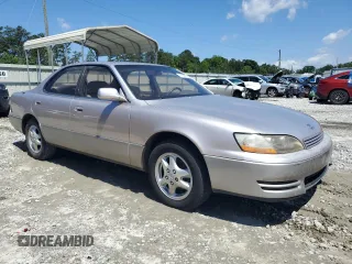 1996 Lexus ES 300 z VIN JT8BF12G6T0185858, wystawiony jako Copart lot #57978925 z przebiegiem 153 841 mil mil oraz Czysty tytuł • Clean title. Historia ofert i sprzedaży dostępna na DreamBid. Obrazek 4.