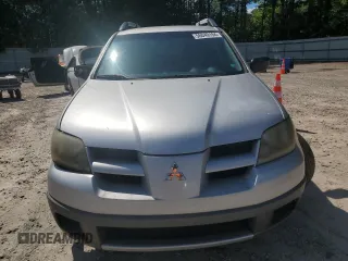 2003 Mitsubishi Outlander LS with VIN JA4LX31G53U115285, listed as a Copart auction lot 56049194 with 254,661 mi miles and Salvage Title. Bid and sale history available at carsss.com. Image 5.