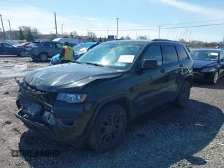 2016 Jeep Grand Cherokee Laredo z VIN 1C4RJFAG2GC454861, wystawiony jako IAAI lot #41964977 z przebiegiem 180 592 mil mil oraz . Historia ofert i sprzedaży dostępna na DreamBid. Obrazek 2.