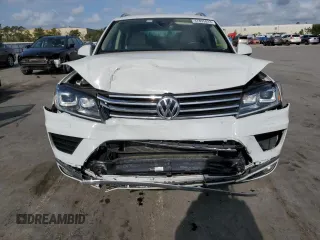 2017 Volkswagen Touareg Sport with VIN WVGEF7BP0HD006792, listed as a Copart auction lot 47895813 with 52,432 mi miles and . Bid and sale history available at DreamBid. Image 5.