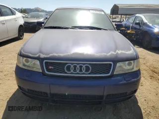 2000 Audi S4 z VIN WAUDD68D6YA126804, wystawiony jako Copart lot #61161455 z przebiegiem 148 158 mil mil oraz Czysty tytuł • Clean title. Historia ofert i sprzedaży dostępna na DreamBid. Obrazek 5.