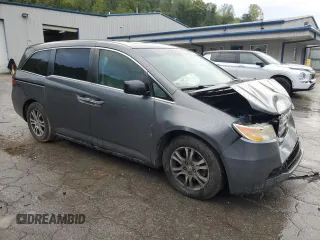 2012 Honda Odyssey EX-L with VIN 5FNRL5H64CB035196, listed as a Copart auction lot 71566704 with 243,529 mi miles and Salvage Title. Bid and sale history available at carsss.com. Image 4.