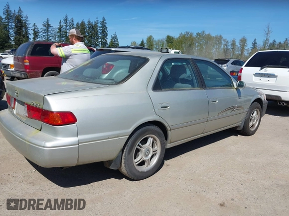 2000 Toyota Camry CE z VIN JT2BG22K6Y0451632, wystawiony jako IAAI lot #42030842 z przebiegiem 200 734 mil mil oraz . Historia ofert i sprzedaży dostępna na DreamBid. Obrazek 4.
