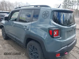 2017 Jeep Renegade Trailhawk z VIN ZACCJBCB5HPF24639, wystawiony jako IAAI lot #42041419 z przebiegiem 80 472 mil mil oraz . Historia ofert i sprzedaży dostępna na DreamBid. Obrazek 3.