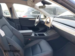 2023 Tesla Model Y Long Range with VIN 7SAYGDEE1PA053215, listed as a IAAI auction lot 41476973 with 58,025 mi miles and . Bid and sale history available at DreamBid. Image 5.