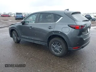 2021 Mazda CX-5 Touring with VIN JM3KFBCM8M0311433, listed as a IAAI auction lot 40554094 with 23,319 mi miles. Bid and sale history available at carsss.com. Image 3.