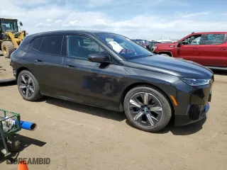 2023 BMW iX xDrive50 with VIN WB523CF03PCM09655, listed as a Copart auction lot 52922124 with 3,159 mi miles. Bid and sale history available at carsss.com. Image 4.