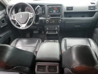 2014 Honda Ridgeline Sport with VIN 5FPYK1F7XEB011983, listed as a Copart auction lot 64146835 with 121,345 mi miles and Salvage title. Bid and sale history available at DreamBid. Image 8.