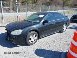 2003 Nissan Altima S with VIN 1N4AL11D33C320084, listed as a IAAI auction lot 41849903 with 212,137 mi miles. Bid and sale history available at carsss.com. Image 19.