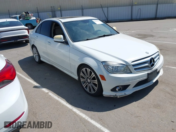 2009 Mercedes-Benz C-Class 3.0L Sport with VIN WDDGF54X09F233877, listed as a IAAI auction lot 42121123 with 215,698 mi miles. Bid and sale history available at carsss.com. Image 1.