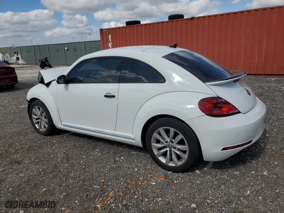 2017 Volkswagen Beetle 1.8T Fleet with VIN 3VWF17AT1HM617468, listed as a Copart auction lot 82233824 with 72,800 mi miles and Salvage Title. Bid and sale history available at carsss.com. Image 2.