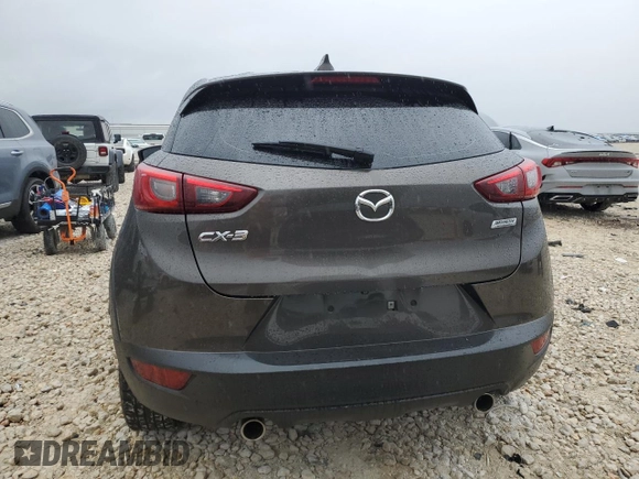 2019 Mazda CX-3 Touring z VIN JM1DKDC71K1408158, wystawiony jako Copart lot #50463675 z przebiegiem 95 578 mil mil oraz Czysty tytuł • Clean title. Historia ofert i sprzedaży dostępna na DreamBid. Obrazek 6.