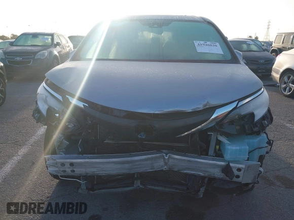 2021 Toyota Sienna XLE with VIN 5TDYRKEC2MS074448, listed as a IAAI auction lot 41946030 with 122,509 mi miles and . Bid and sale history available at DreamBid. Image 6.