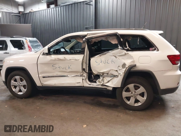 2013 Jeep Grand Cherokee Laredo with VIN 1C4RJFAG9DC532919, listed as a IAAI auction lot 40918828 with 140,093 mi miles. Bid and sale history available at carsss.com. Image 6.