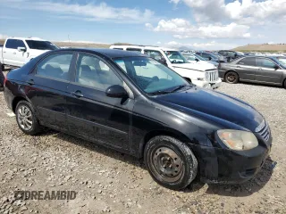 2009 Kia Spectra EX with VIN KNAFE222795620430, listed as a Copart auction lot 51170895 with 172,719 mi miles and Salvage Title. Bid and sale history available at carsss.com. Image 4.
