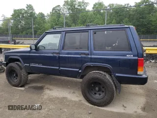 1997 Jeep Cherokee Country with VIN 1J4FJ78S4VL589852, listed as a Copart auction lot 56294015 with 189,530 mi miles and Salvage title. Bid and sale history available at DreamBid. Image 2.