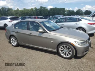 2011 BMW 3 Series 328i with VIN WBAPH5C55BA440544, listed as a Copart auction lot 61557015 with 135,252 mi miles and Salvage title. Bid and sale history available at DreamBid. Image 4.