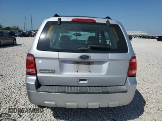 2011 Ford Escape XLS с VIN 1FMCU0C70BKB97667, выставлен на аукционе Copart как лот 52709365 с пробегом 140 582 миль миль и Списание • Salvage title. История ставок и продаж доступна на DreamBid. Изображение 6.