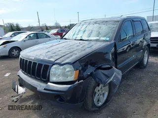 2008 Jeep Grand Cherokee Laredo with VIN 1J8GR48K48C119836, listed as a IAAI auction lot 42114083 with 129,352 mi miles. Bid and sale history available at carsss.com. Image 2.