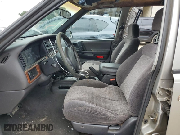 1998 Jeep Grand Cherokee Laredo with VIN 1J4FX58S7WC350624, listed as a Copart auction lot 63063624 with 0 mi miles and Salvage Title. Bid and sale history available at carsss.com. Image 7.