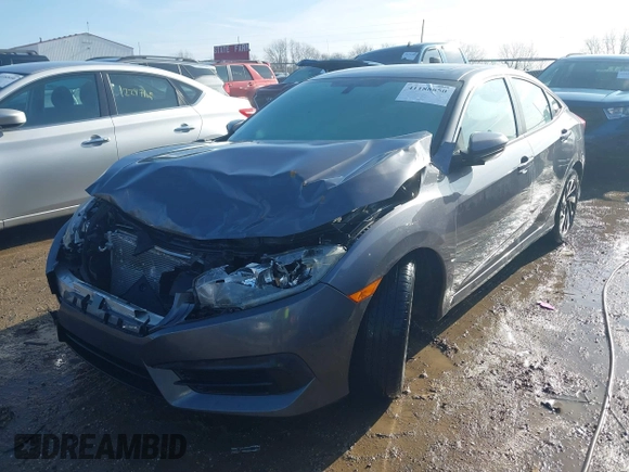 2016 Honda Civic EX with VIN 19XFC2F74GE014325, listed as a IAAI auction lot 41188650 with 117,040 mi miles and . Bid and sale history available at DreamBid. Image 17.